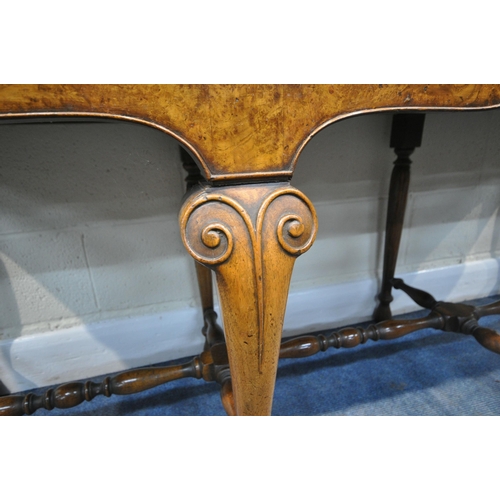 244 - A QUEEN ANNE STYLE BURR ELM DRESSER BASE, fitted with three drawers, raised on front cabriole legs, ... 