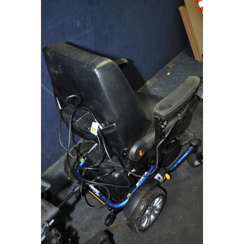 2 - A ROMA RENO ELITE ELECTRIC WHEELCHAIR, with power supply (no key required) along with a Genesis Roll... 