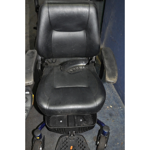 2 - A ROMA RENO ELITE ELECTRIC WHEELCHAIR, with power supply (no key required) along with a Genesis Roll... 