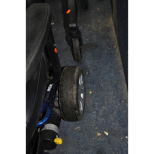 2 - A ROMA RENO ELITE ELECTRIC WHEELCHAIR, with power supply (no key required) along with a Genesis Roll... 