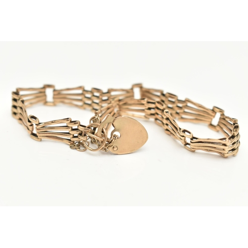 405 - A 9CT GOLD GATE BRACELET, fitted with a heart padlock clasp, hallmarked 9ct London, with additional ... 