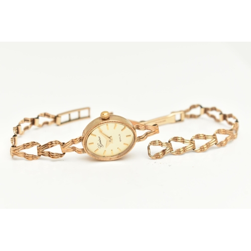 407 - A LADIES 9CT GOLD 'GENEVE' WRISTWATCH, quartz movement, oval gold dial signed 'Geneve Gold', baton m... 