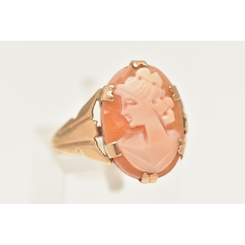 420 - A 9CT GOLD CAMEO RING, an oval shell cameo depicting a female profile, prong set in yellow gold, tap... 