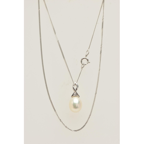 424 - A 9CT GOLD AND PEARL NECKLACE, an oval cultured pearl set in a white gold cross over mount set with ... 