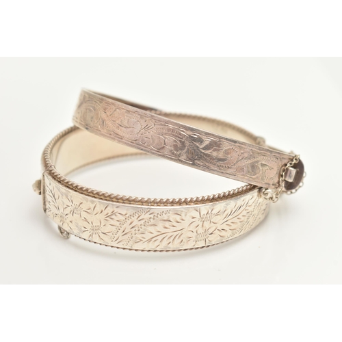 427 - TWO SILVER BANGLES, the first a hinged bangle with etched floral and rope detail, approximate width ... 