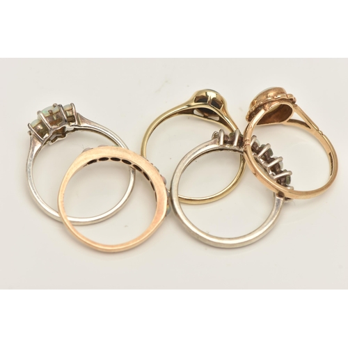 442 - THREE 9CT GOLD OPAL SET RINGS AND TWO WHITE METAL RINGS, to include an oval white opal cabochon ring... 