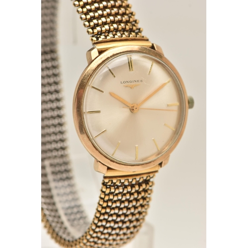 443 - A GENTS 9CT GOLD LONGINES WRISTWATCH, manual wind, round silvered dial signed Longines, baton ma... 