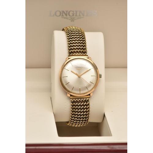 443 - A GENTS 9CT GOLD LONGINES WRISTWATCH, manual wind, round silvered dial signed Longines, baton ma... 