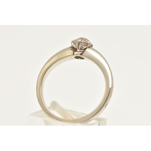 446 - A WHITE METAL DIAMOND SINGLE STONE RING, set with an old cut diamond, measuring approximately 5.7mm ... 