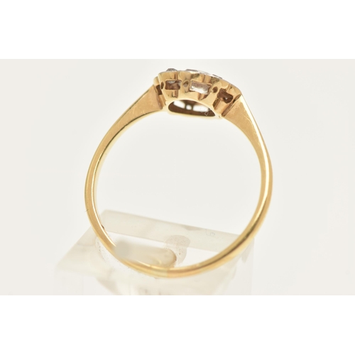 448 - A YELLOW METAL DIAMOND DAISY RING, centering on an old cut diamond, spreads approximately 0.50ct, wi... 