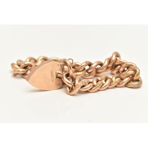 462 - A ROSE METAL CURB LINK BRACELET WITH HEART PADLOCK CLASP, alternating textured and polished hollow l... 