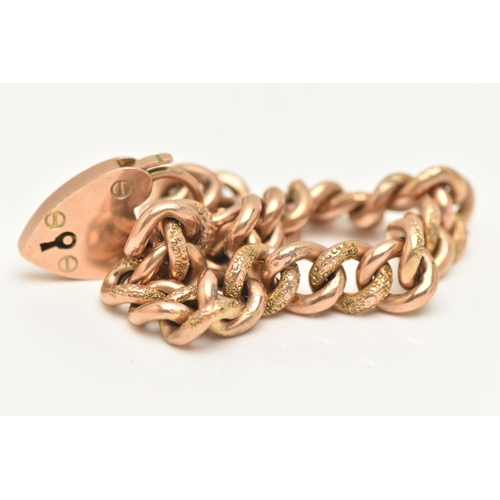 462 - A ROSE METAL CURB LINK BRACELET WITH HEART PADLOCK CLASP, alternating textured and polished hollow l... 