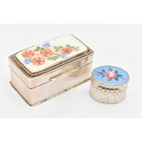 469 - TWO SILVER AND ENAMEL PILL BOXES, the first of a rectangular form, decorated with a floral pattern t... 