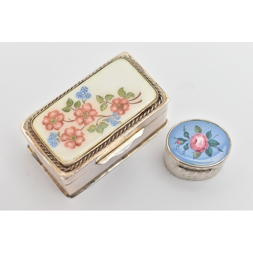 469 - TWO SILVER AND ENAMEL PILL BOXES, the first of a rectangular form, decorated with a floral pattern t... 