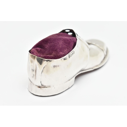 470 - AN EARLY 20TH CENTURY PIN CUSHION, in the form of a gents shoe, with purple fabric cushion, markers ... 