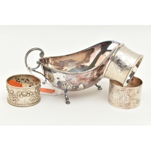 473 - A SILVER SAUCE BOAT, TWO SILVER NAPKIN RINGS AND ONE WHITE METAL NAPKIN RING, the polished form sauc... 