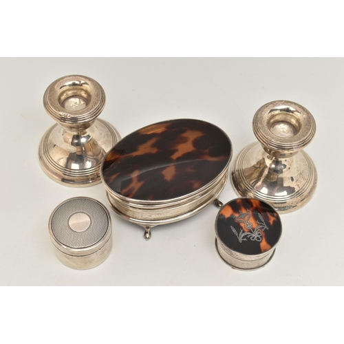 479 - A SELECTION OF SILVER ITEMS, to include a pair of silver dwarf candle sticks on round weighted bases... 