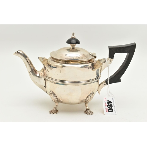 480 - AN EARLY 20TH CENTURY SILVER TEAPOT, polished teapot with wavy rim, fitted with an ebonised handle a... 