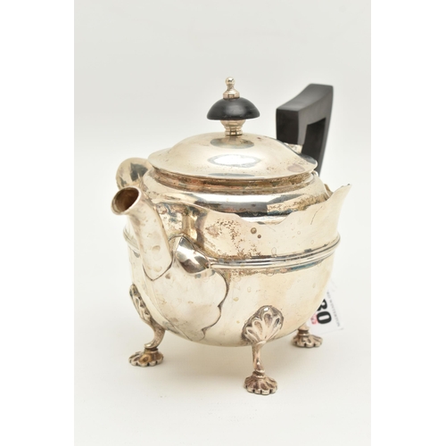 480 - AN EARLY 20TH CENTURY SILVER TEAPOT, polished teapot with wavy rim, fitted with an ebonised handle a... 