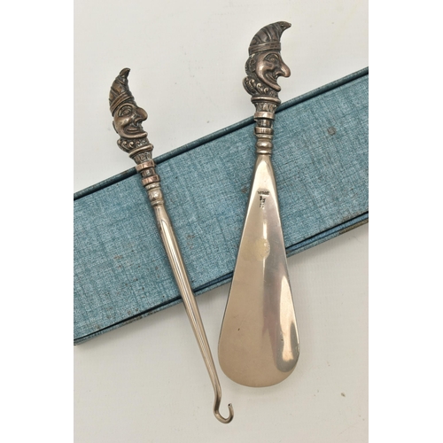 481 - A SILVER HANDLED SHOE HORN AND BUTTON HOOK, each terminal depicting Punch, hallmarked 'Crisford & No... 