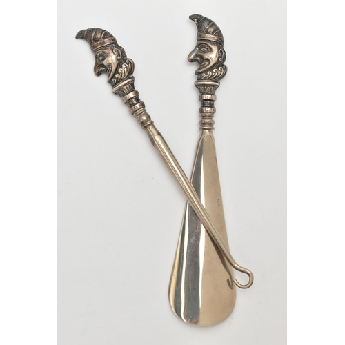 481 - A SILVER HANDLED SHOE HORN AND BUTTON HOOK, each terminal depicting Punch, hallmarked 'Crisford & No... 