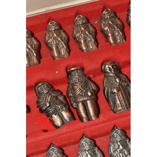 780 - A BOX AND LOOSE CHESS PIECES AND COLLECTORS DOLLS, comprising an Ajedrez metal chess set in a fitted... 