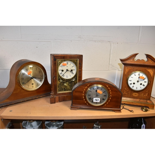 787 - A GROUP OF FOUR EARLY 20TH CENTURY CLOCKS, comprising a bracket clock, gong striking with a printed ... 