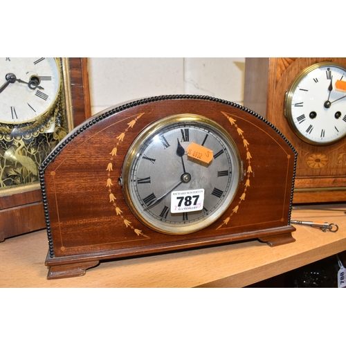 787 - A GROUP OF FOUR EARLY 20TH CENTURY CLOCKS, comprising a bracket clock, gong striking with a printed ... 