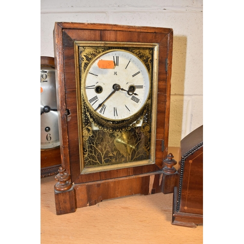 787 - A GROUP OF FOUR EARLY 20TH CENTURY CLOCKS, comprising a bracket clock, gong striking with a printed ... 