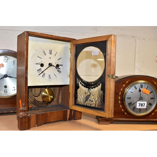 787 - A GROUP OF FOUR EARLY 20TH CENTURY CLOCKS, comprising a bracket clock, gong striking with a printed ... 