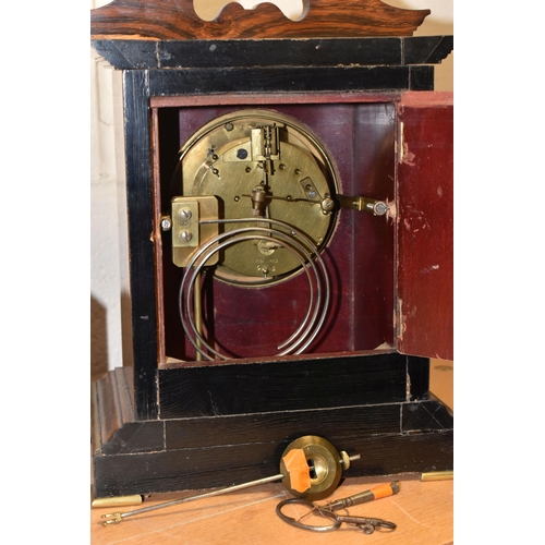 787 - A GROUP OF FOUR EARLY 20TH CENTURY CLOCKS, comprising a bracket clock, gong striking with a printed ... 