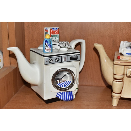 810 - EIGHT NOVELTY TEAPOTS, comprising a South-West Ceramics Ltd Alice in Wonderland themed teapot (two s... 