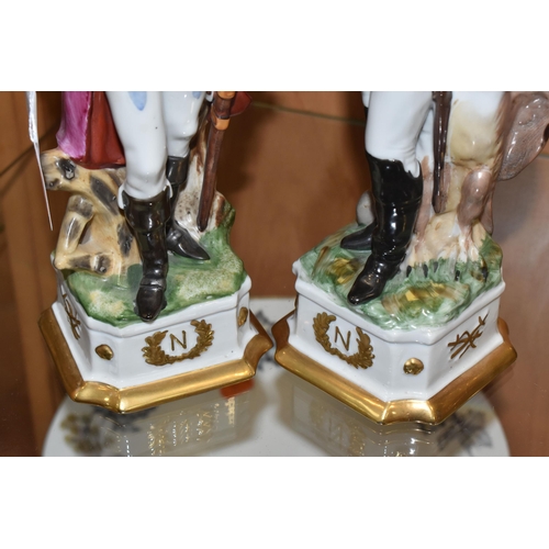 819 - TWO CAPODIMONTE-STYLE NAPOLEONIC FIGURES comprising Napoleon with his hand under his jacket beside a... 