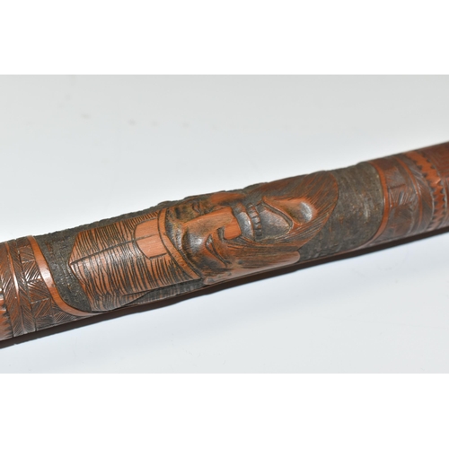 831 - A JAPANESE MEIJI PERIOD SAMURAI CARVED BAMBOO WALKING STICK carved in relief with five carved faces ... 