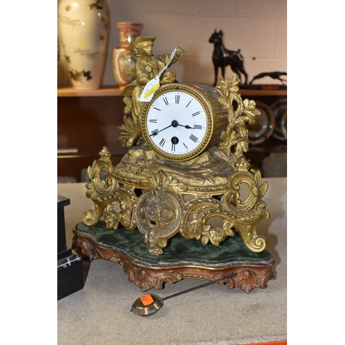 835 - A GILDED METAL CLOCK AND A BLACK SLATE AND MARBLE CLOCK GARNITURE comprising a gilded metal mantel c... 