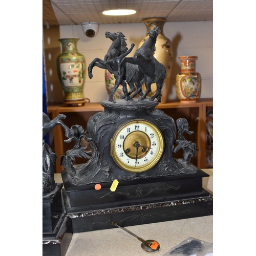 835 - A GILDED METAL CLOCK AND A BLACK SLATE AND MARBLE CLOCK GARNITURE comprising a gilded metal mantel c... 