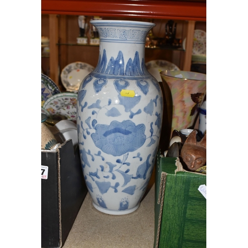 847 - TWO BOXES AND LOOSE CERAMICS to include three water jugs, a blue and white vase, a large blue and wh... 