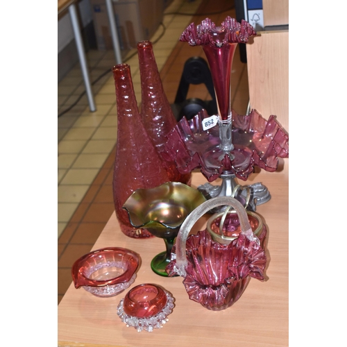 852 - A GROUP OF MOSTLY CRANBERRY GLASS to include a single trumpet cranberry glass epergne, possibly Carr... 