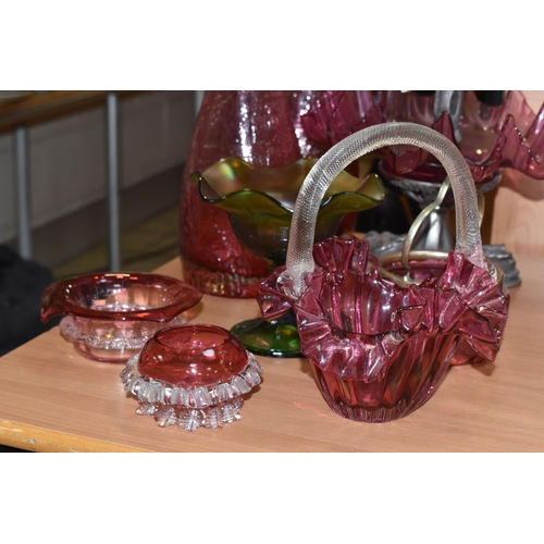 852 - A GROUP OF MOSTLY CRANBERRY GLASS to include a single trumpet cranberry glass epergne, possibly Carr... 