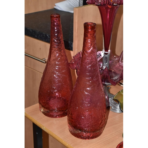 852 - A GROUP OF MOSTLY CRANBERRY GLASS to include a single trumpet cranberry glass epergne, possibly Carr... 