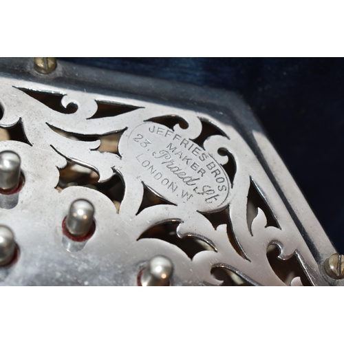 857 - AN EARLY TWENTIETH CENTURY JEFFRIES  BROS BOXED ANGLO CONCERTINA 30 buttons mounted on pierced folia... 