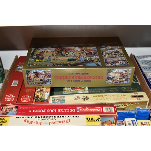 873 - SIX BOXES OF JIGSAW PUZZLES, including approximately sixty puzzles up to 1500 pieces, various themes... 