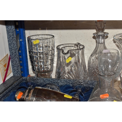 891 - A QUANTITY OF MIXED GLASSWARES to include two Dartington square-based glass vases in blue and smoky ... 