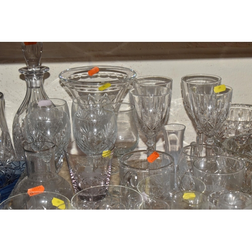 891 - A QUANTITY OF MIXED GLASSWARES to include two Dartington square-based glass vases in blue and smoky ... 