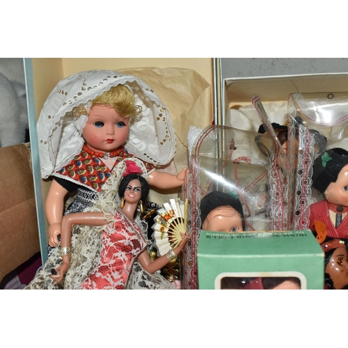 894 - TWO BOXES OF STUFFED TOYS AND FOLK COSTUME DOLLS to include a box of approximately twenty-five vario... 