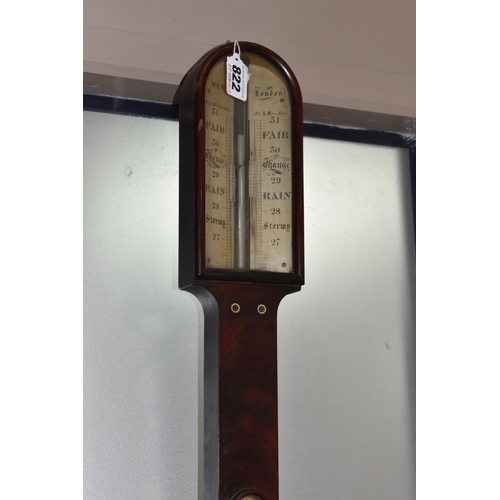 822 - A GEORGIAN CISTERN BAROMETER, in flame cut mahogany, the arched glass door enclosing a face signed '... 