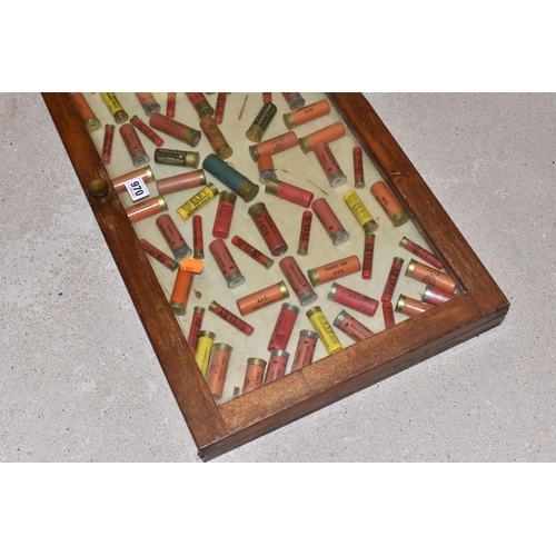 970 - A GLAZED DISPLAY CASE CONTAINING APPROXIMATELY EIGHTY  8, 10, 12 BORE AND .410 GUN CARTRIDGES, brand... 