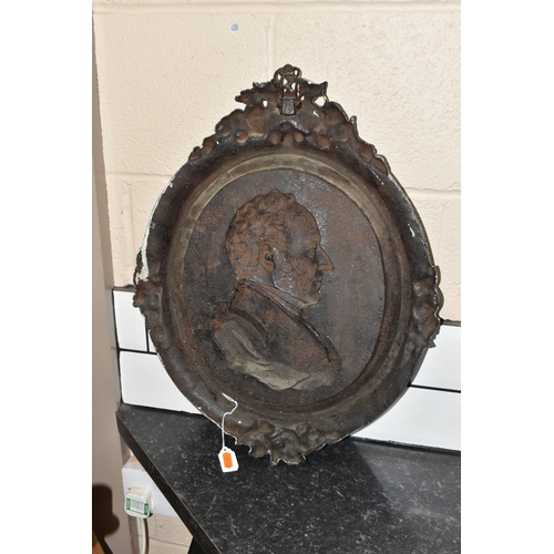 830 - A CAST IRON PORTRAIT WALL PLAQUE, bearing a relief moulded side profile of Prince Albert, within a d... 