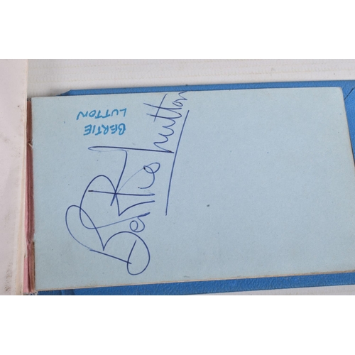 21 - A NUMBER OF SPORTING AUTOGRAPHS, an autograph book signed by various footballers such as Paddy Buckl... 