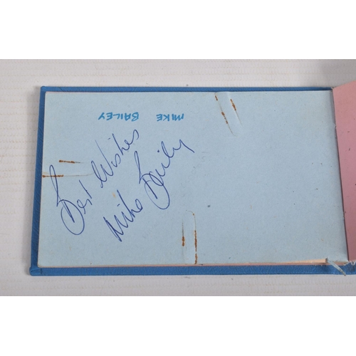 21 - A NUMBER OF SPORTING AUTOGRAPHS, an autograph book signed by various footballers such as Paddy Buckl... 